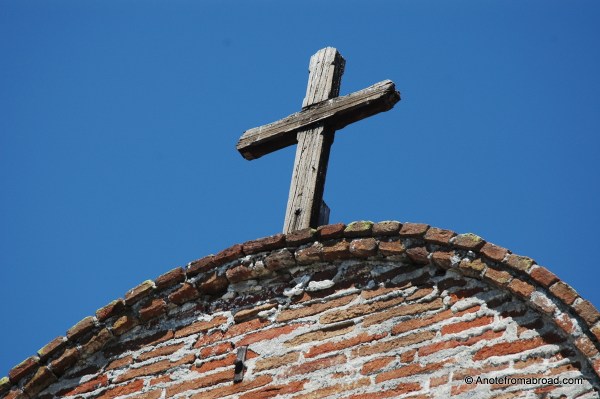 Wooden cross still overshadows the courtyard