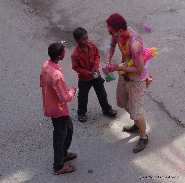 Water cannons with colored water are used to drench anyone in the line of fire