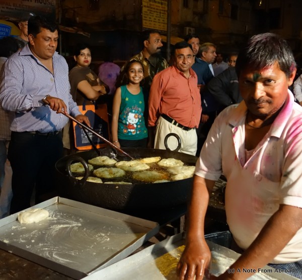 Frying up a form of bread.  Dick and Karen got some to try.  It came with some kind of a sweet grain dip and hot beans.