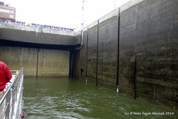 Rear door closed, people watching from bridge