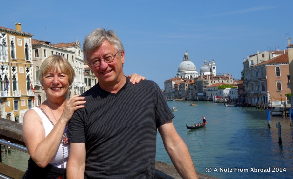 Standing on a bridge over the Grand Canal in Venice