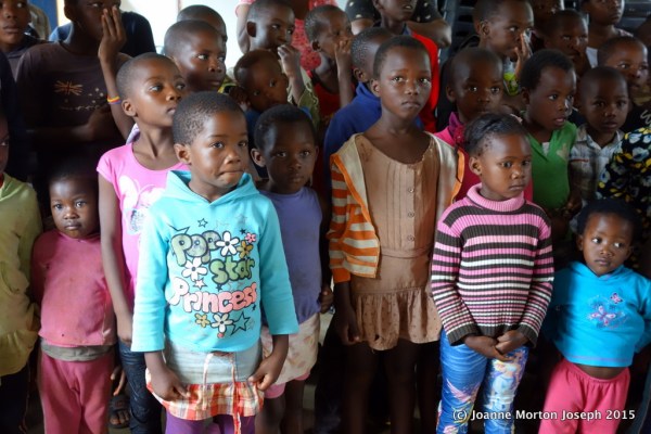 Children welcoming us