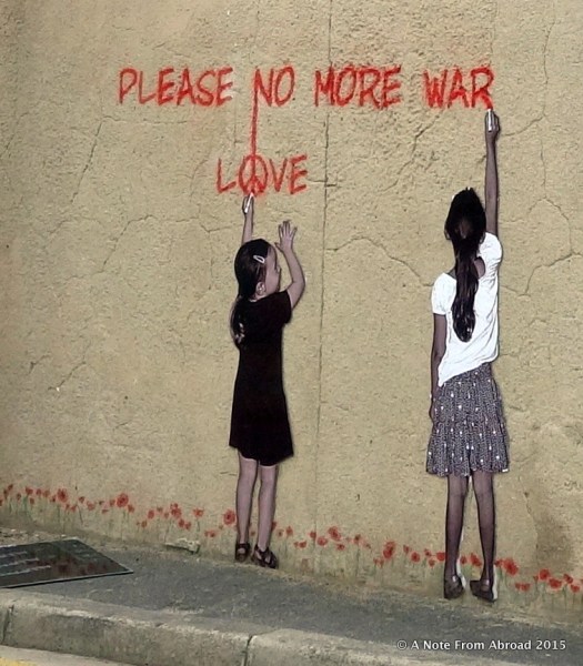 Sign on the wall in Arromanches