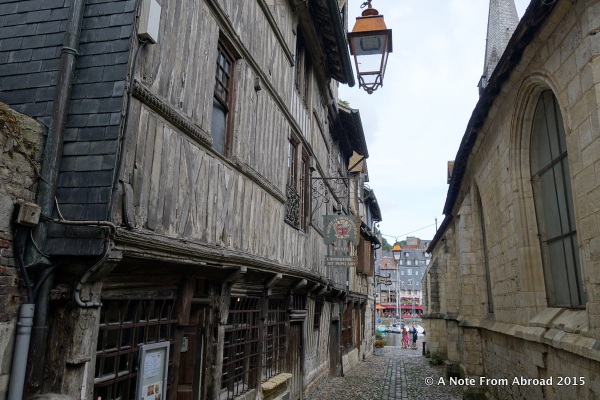 Down an alley, walking toward the harbor