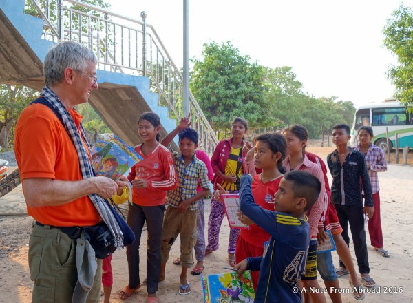 Tim passing out puzzles