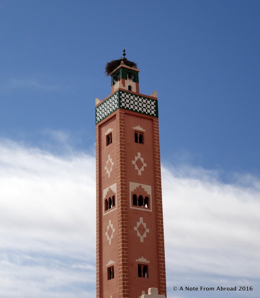 Stork nest on top of the square Berber style minaret