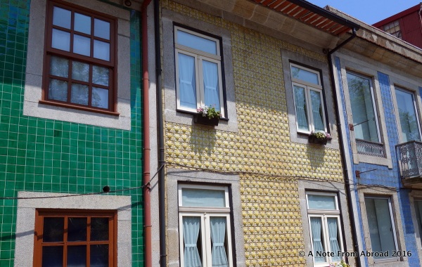 Tile work on the side of buildings is quite common here