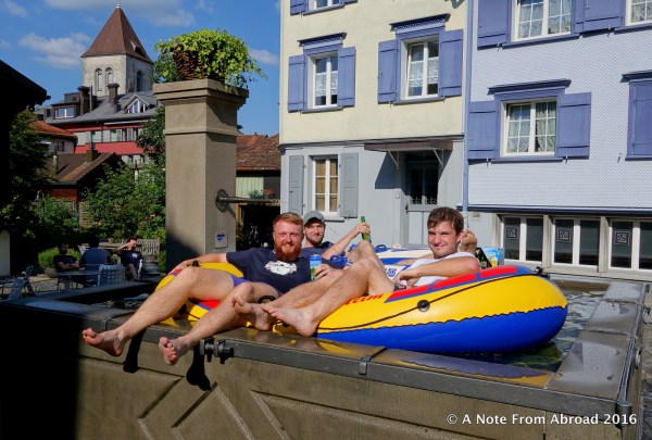 Looks like they are having fun, as well as enjoying a local beer.