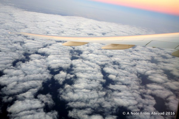 The sunset was reflected on the airplane wing as we left Los Angeles