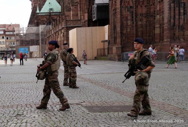 Heavy armed guard presence, especially around the cathedral