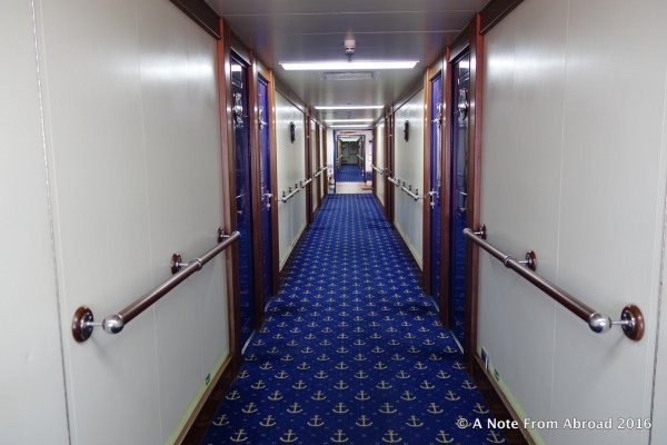 Long hallways with nautical carpeting